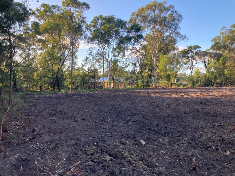Wide view of the finished Capalaba site at dusk