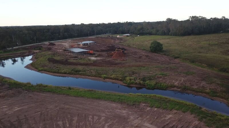 Cleared and shaped development site beside a dam at Stockleigh